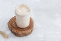 Close-up of jar with natural homemade sourdough levain starter for homemade bakery Royalty Free Stock Photo