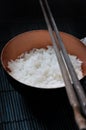 Close up Jasmine Rice in Bowl with Chopstick