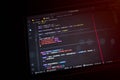 Close-up of JavaScript code on a laptop screen using React and Axios in a dark theme IDE environment, representing modern web Royalty Free Stock Photo