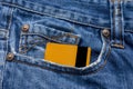 Close-up of jeans pocket with credit card