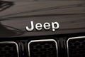 Close up of the Jeep car brand logo on dark background