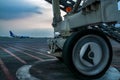 close up of jetway wheels on the airport apron