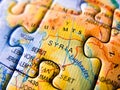 Close up of a jigsaw puzzle map depicting Syria Royalty Free Stock Photo