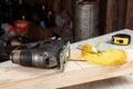 Close-up of a jigsaw on a wooden board. Construction, carpentry