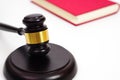 Close up of judge gavel, lawyer, law, justice with law book in background. Royalty Free Stock Photo