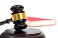 Close up of judge gavel, lawyer, law, justice with law book in background. Royalty Free Stock Photo