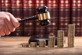 Close-up Of A Judge`s Hand Holding Gavel Royalty Free Stock Photo