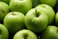 Close up Juicy green apple glistening with refreshing morning dew drops Royalty Free Stock Photo