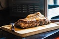 Close up Juicy homemade Pork Rib Meat on Top of Wooden Cutting Board