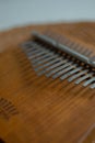 Close-up of a kalimba musical instrument made of brown wood