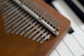 Close-up of a kalimba musical instrument made of brown wood