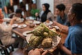 Ketupat with people eating on the background