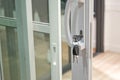 Close up Key and Glass door. Royalty Free Stock Photo