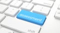 Close-up of a keyboard featuring a blue key marked assessment Royalty Free Stock Photo