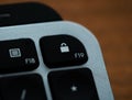 Close up of Keyboard lock key on space grey metal