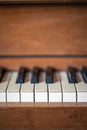 Close-up, keys of an antique wooden piano.