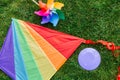 close up of kite, frisbee and pinwheel on grass Royalty Free Stock Photo