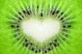 Close up of kiwi fruit texture background with heart shape