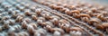 Close-up of knitted fabric with detailed brown yarn textures Royalty Free Stock Photo