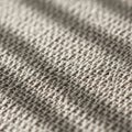 Close up of a knitted fabric displaying a textured woven pattern Royalty Free Stock Photo