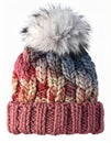 Close Up of a Knitted Multicolor Winter Hat with a Pom Pom on a White Background Royalty Free Stock Photo