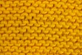 Close-up of knitted wool texture, background, mustard, yellow Royalty Free Stock Photo