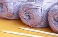 Close-up, knitting texture. Ball of violet thread and knitting needles. Royalty Free Stock Photo