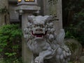 Close up Komainu dog-lionstone statue at the Shrine in Japan.