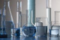 Close up of labware such as beaker, flask, graduated cylinders and test tubes well placed