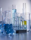 Close up of labware such as beaker, flask, graduated cylinders and test tubes well placed