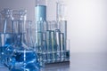Close up of labware such as beaker, flask, graduated cylinders and test tubes well placed