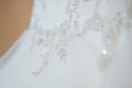 Close up of a lace on a wedding dress. High quality photo.