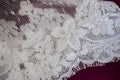 Close up of a lace on a wedding dress. High quality photo.