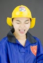 Close up of a lady firefighter shouting