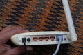 Close up lan network connected to Ethernet RJ45 port to wireless modem router network hub