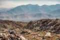close-up of a landfill, with mountains of trash and debris visible