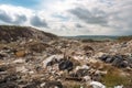 close-up of a landfill, with trash and debris visible