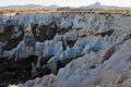 Close-up landscape view of typical geologic formations of Cappadocia. Amazing shaped sandstone rocks Royalty Free Stock Photo