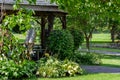 Close up landscaped view of a brown wooden gazebo