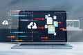 Close up of laptop with creative big data transfer and digital transformation hologram on concrete wall background. Royalty Free Stock Photo