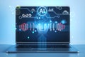 Close up of laptop on desk with creative polygonal human head and icons hologram on blurry background. Artificial intelligence,