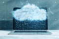 Close up of laptop with digital glowing polygonal cloud mesh on blurry background. Storage technology concepts transfer data to