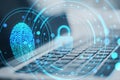 Close up of laptop keyboard with creative digital padlock hologram on blurry toned background with fingerprint. Security, safety Royalty Free Stock Photo