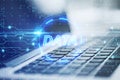 Close up of laptop keyboard with glowing digital data hologram on blurry background. Technology, information and innovation Royalty Free Stock Photo