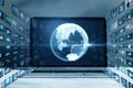 Close up of laptop monitor with creative glowing polygonal globe with rows of images on blurry background. Connecting