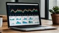 Close-up of a laptop screen displaying analytics data and sales trends for a small online business