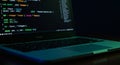 Close Up of Laptop Screen Displaying Programming Code in Dark Environment Royalty Free Stock Photo