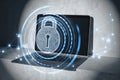 Close up of laptop in spotlight on desk with glowing polygonal padlock hologram on blurry background. Secure, safety and Royalty Free Stock Photo