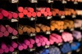 Close-up assortment of colorful multicolored vibrant pencils and crayons on display for sale, in school stationery shop