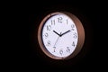 Close up of a Large Decorative ticking wall clock in metallic rose gold color and white face, accurate time as it is fitted with Royalty Free Stock Photo